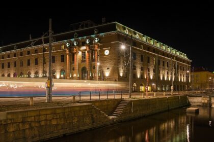 An image showing a full moon over Stockholm, capturing the essence of Sweden nightlife.