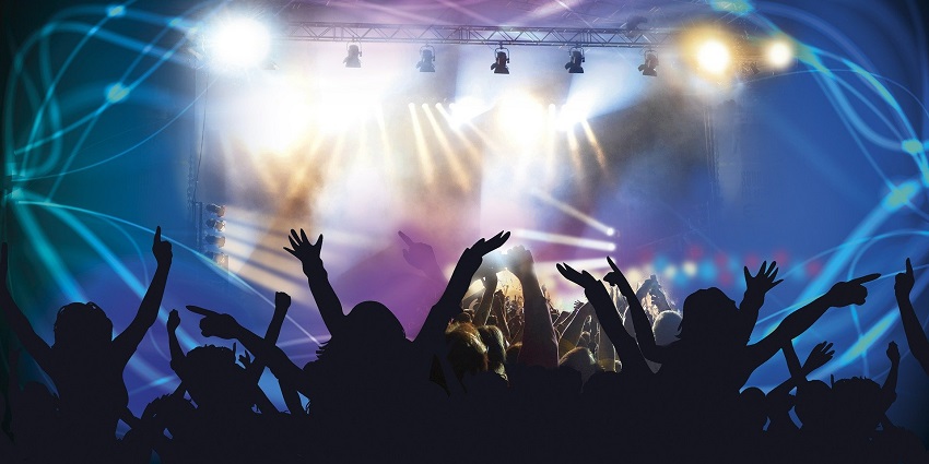 A lively bar scene, with people dancing, and enjoying the vibrant atmosphere of Pune nightlife.