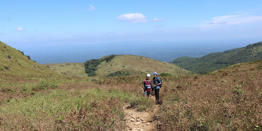An image of Tadiandamol Trek View from a viewpoint, one of the places for trekking in Western Ghats