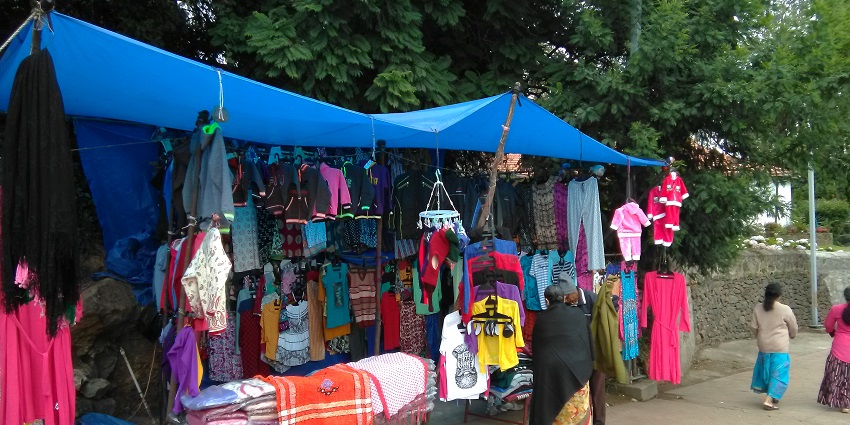 A picture of a street shop with clothes in Coaker’s Walk with valley views.