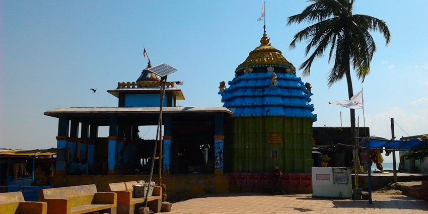An image of Kalijai Temple marked on a small island surrounded by boats and tranquil waters