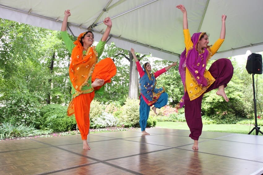 A picture of dancers doing Bhangra during the harvest festival of Punjab celebrations