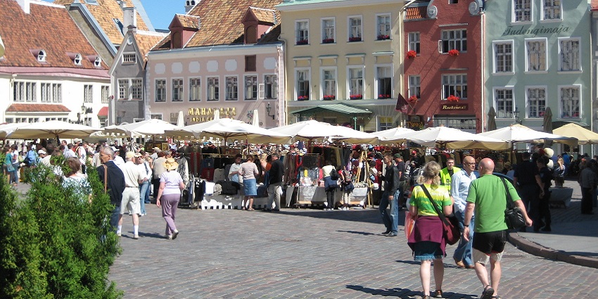 A UNESCO medieval cityscape with cobblestone streets, gothic architecture, and landmarks.