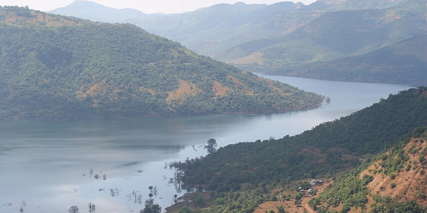 Paddling a kayak over a thrilling destination of lakes in Pune for an adventure enthusiast