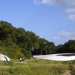 An image of Teshima Art Museum’s organic architecture harmonising with nature’s elements