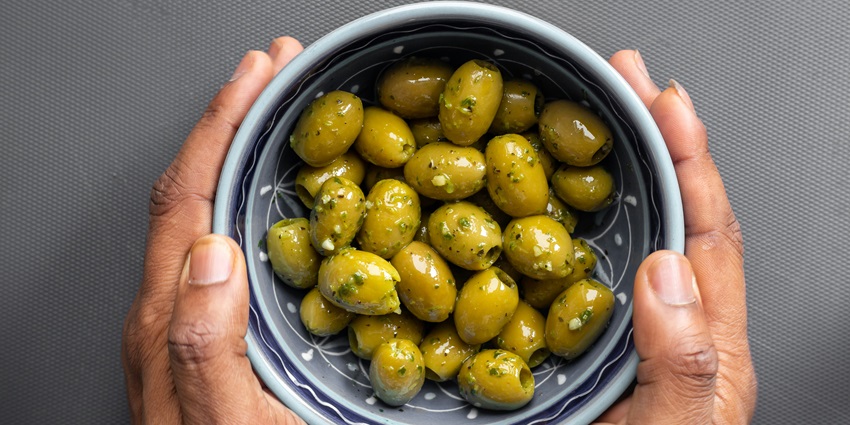 Taste the tangy delight of Thanjavur Maavadu, the city's signature mango pickle.