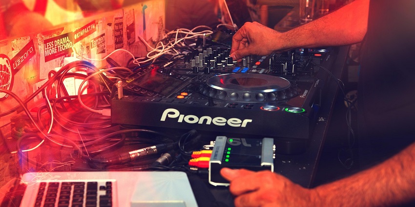 A view of the DJ setup, with turntables and mixers, awaiting the night’s crowd in Pune.