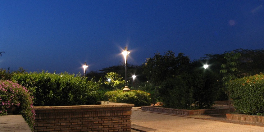 Long walkways lit up at night at a top garden near the biggest shopping mall in Delhi