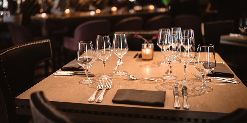 A rooftop bar with creative cocktails, skyline views, and a relaxed yet sophisticated backdrop.