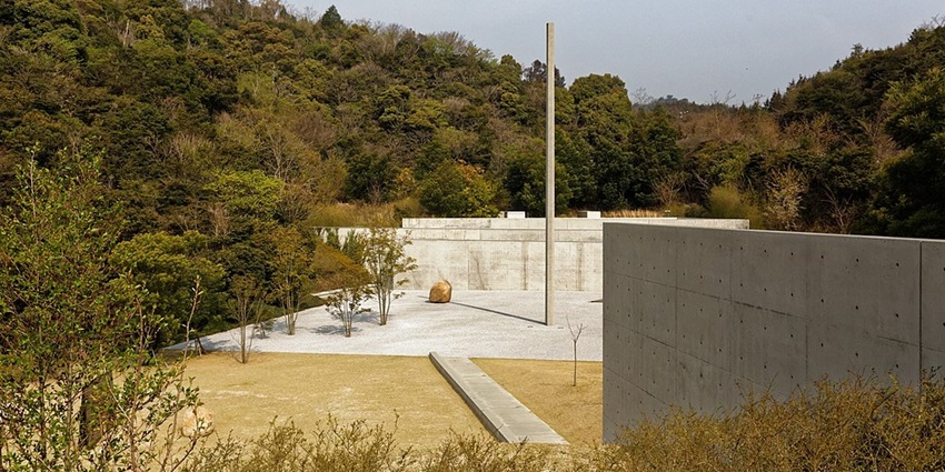 The Lee Ufan Museum, surrounded by trees, features large installations and paintings.