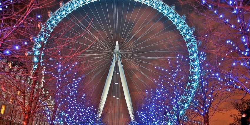 An image showing the London Eye at night, one of the best places for Valentine's Day in London.