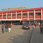 A picture of the Kharagpur Railway station with passengers commuting