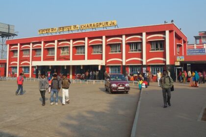 A picture of the Kharagpur Railway station with passengers commuting