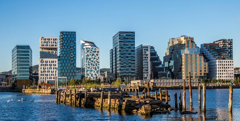 An image of body of water near city buildings a remarkable thing to see in Oslo