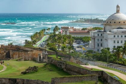 El Morro fortress in Puerto Rico, overlooking the coast with buildings in the distance