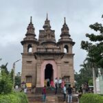 A picture of the Buddhist temple in Sarnath, showcasing intricate architecture and serenity.