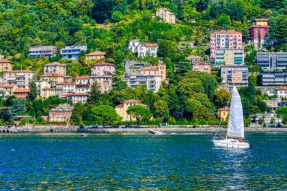 Tourists enjoy the serene lakefront , one of the best things to do at Lake Como.