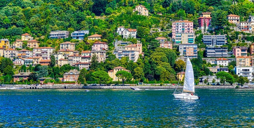 Tourists enjoy the serene lakefront , one of the best things to do at Lake Como.