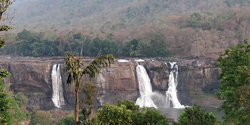 An image showing the mesmerising view of the Athirappilly waterfalls.