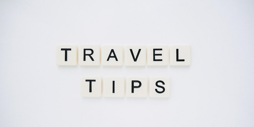 An image spelling 'TRAVEL TIPS' on background, suggesting helpful advice for travellers