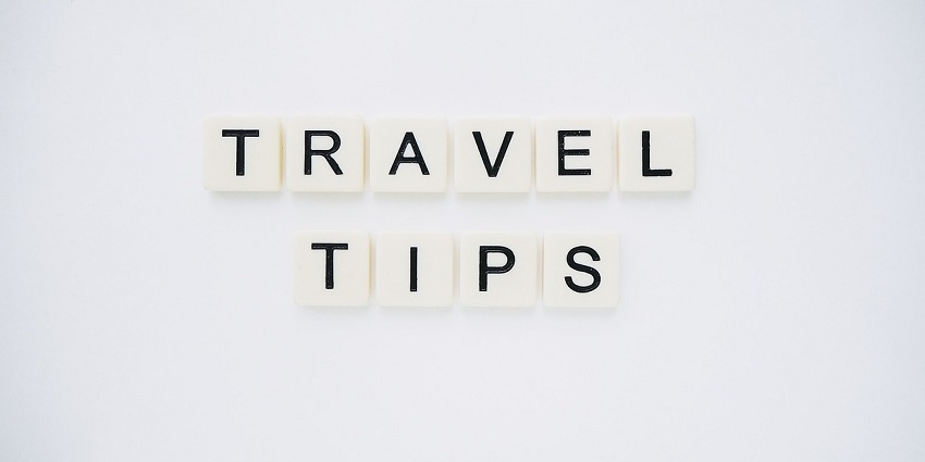 An image spelling 'TRAVEL TIPS' on background, suggesting helpful advice for travellers