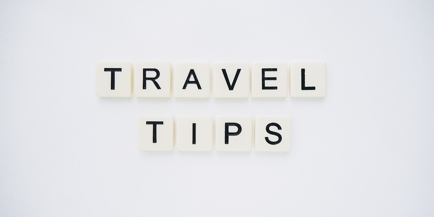An image spelling 'TRAVEL TIPS' on background, suggesting helpful advice for travellers
