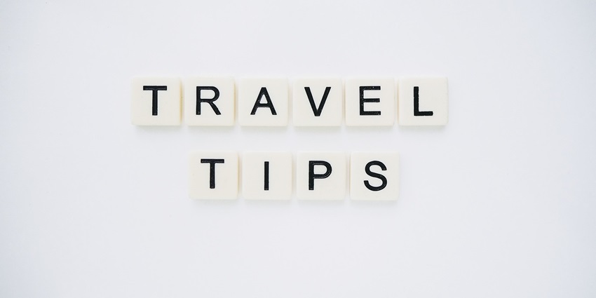 An image spelling 'TRAVEL TIPS' on background, suggesting helpful advice for travellers