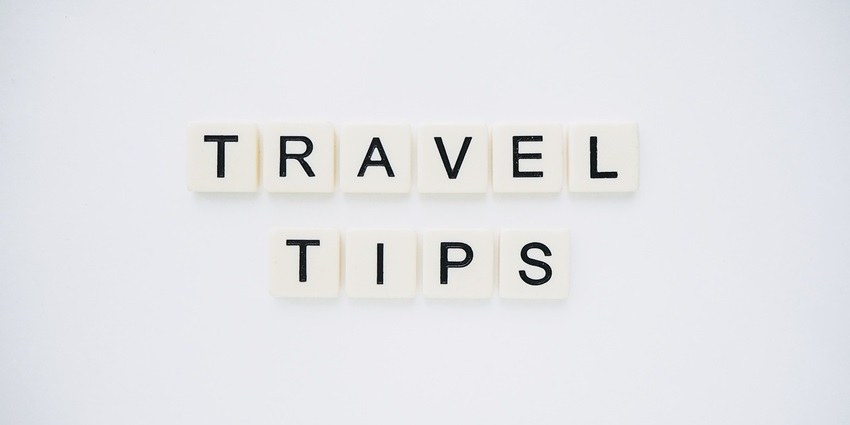 An image spelling 'TRAVEL TIPS' on background, suggesting helpful advice for travellers