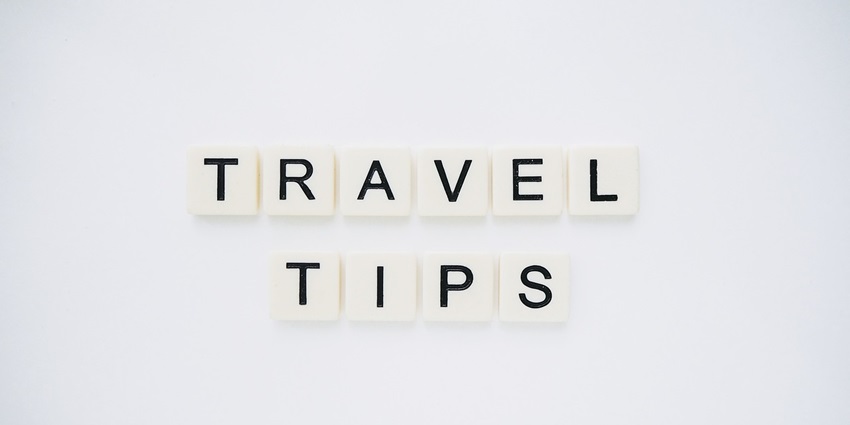 An image spelling 'TRAVEL TIPS' on background, suggesting helpful advice for travellers