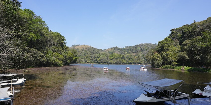 Tourists enjoying a boat ride on one of the lakes in Wayanad.
