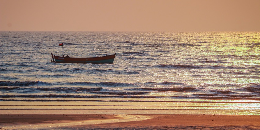An image showing Tithal Beach at sunset, highlighting one of the popular beaches in North India.