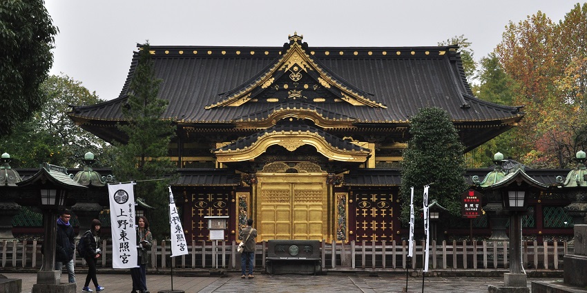 Ornate Shinto shrine dedicated to Tokugawa Ieyasu with intricate carvings, situated in Nikko National Park.