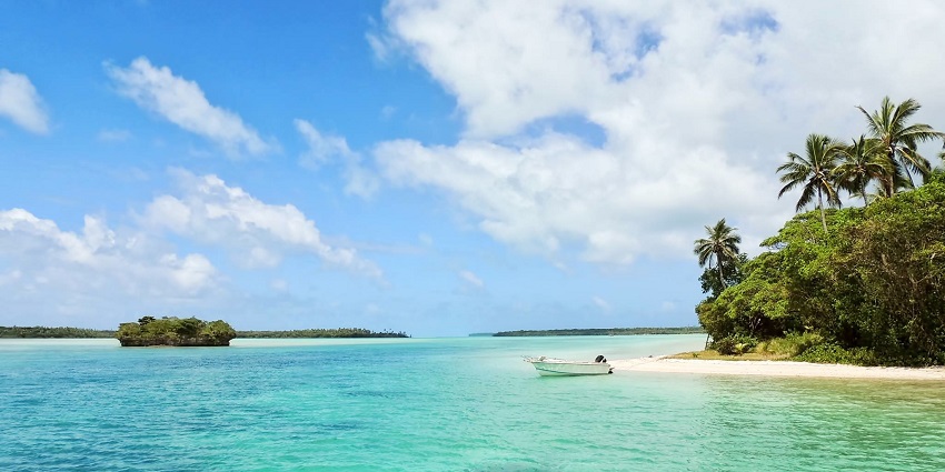 Enjoy the stunning beauty of Treasure Cay Beach, a top Bahamas beach with clear waters and lush greenery