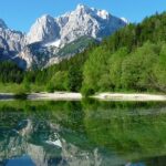 Stunning scenery seen at the Triglav National Park, with lakes and snow-covered mountains