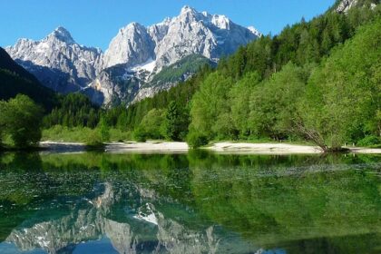 Stunning scenery seen at the Triglav National Park, with lakes and snow-covered mountains