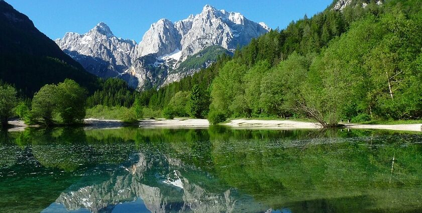 Stunning scenery seen at the Triglav National Park, with lakes and snow-covered mountains