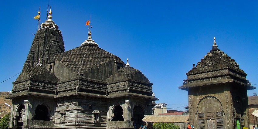 Devotees in the courtyard of Trimbakeshwar Temple in Nashik District, Maharashtra.
