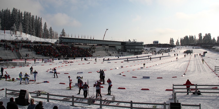 An image of people skiing at the Holmenkollen Ski Centre, one of the best experiences.