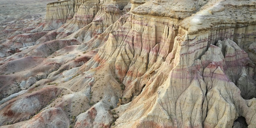 Stunning cliff formations resembling Buddhist stupas in the desert landscape.
