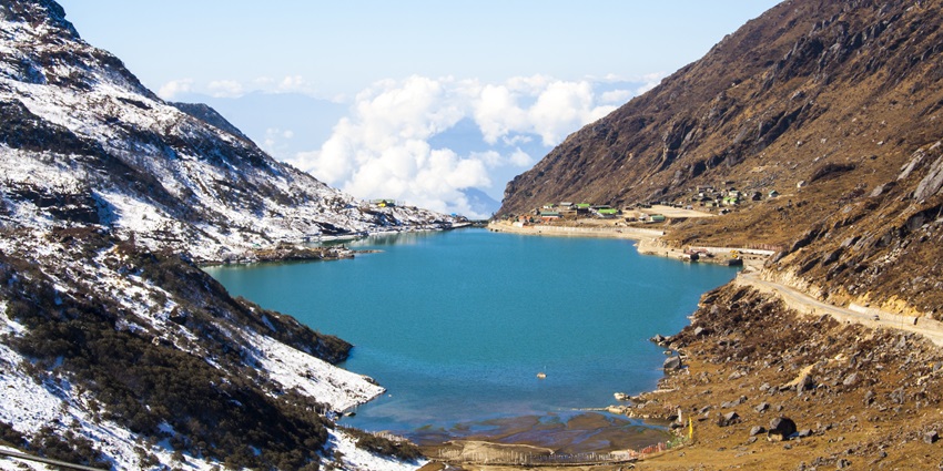 An image of Tsongmo Lake in Sikkim, one of the famous lakes in India, amid mountains.
