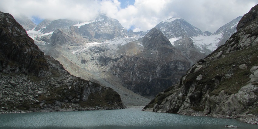 An image of Tulian Lake in Pahalgam and the majestic snow-covered mountains around it