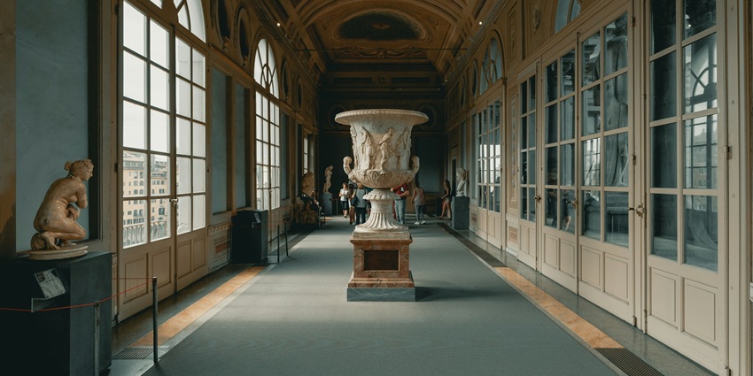 Visitors admiring Renaissance masterpieces at an Art Museum in Italy