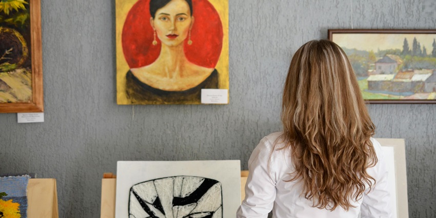 Art enthusiast observing bold designs at the Modern Art Museum Lisbon
