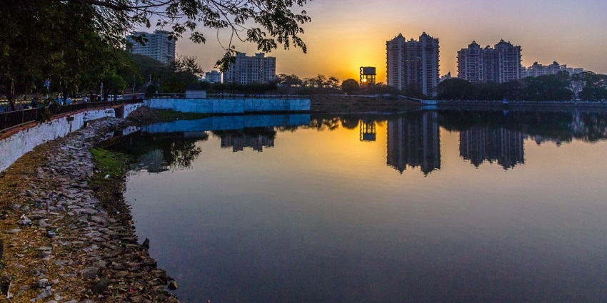 Serene Lake is surrounded by greenery, ideal for relaxation and walks, as featured in the Thane city guide.