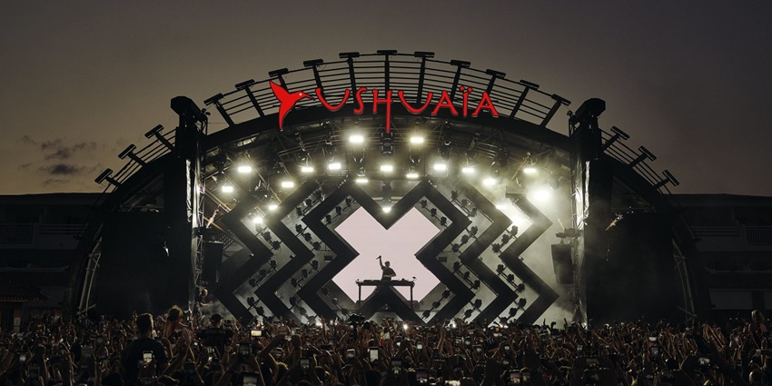 DJ Martin Garrix performing live at Ushuaïa Ibiza, people enjoying Ibiza Spain nightlife
