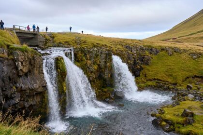 An image showing waterfalls cascading over rocks in Iceland, perfect for Valentine's Day in Iceland.