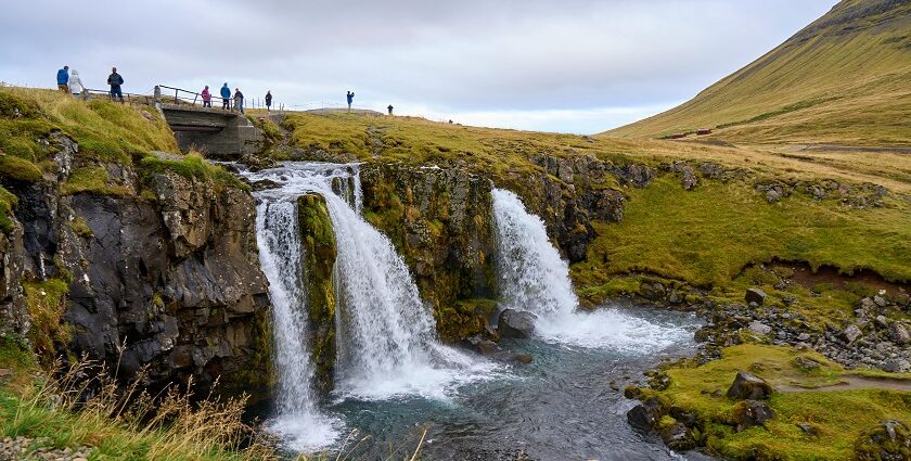 An image showing waterfalls cascading over rocks in Iceland, perfect for Valentine's Day in Iceland.