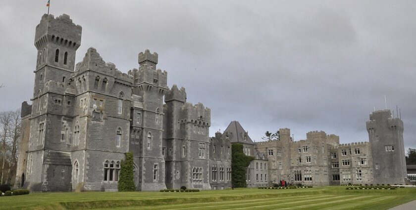 An image showing Ashford Castle by the lake, an ideal spot for Valentine’s Day in Ireland.