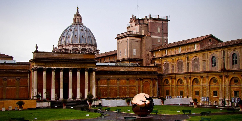 An image of The Vatican Museums' courtyard featuring the Sphere Within Sphere sculpture