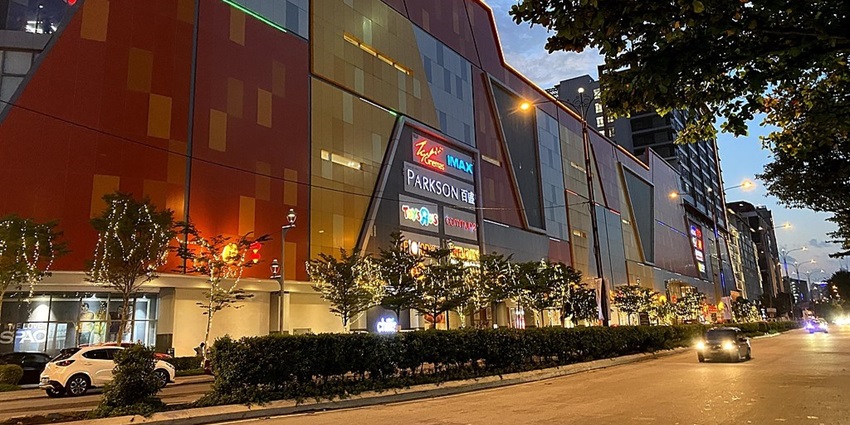 Trendy mall featuring fashion stores, cafes, and movie screenings